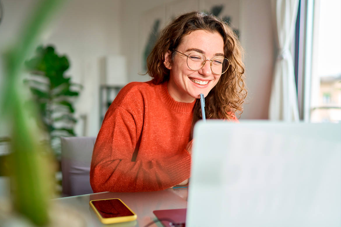 woman speaking with a smile while videocall